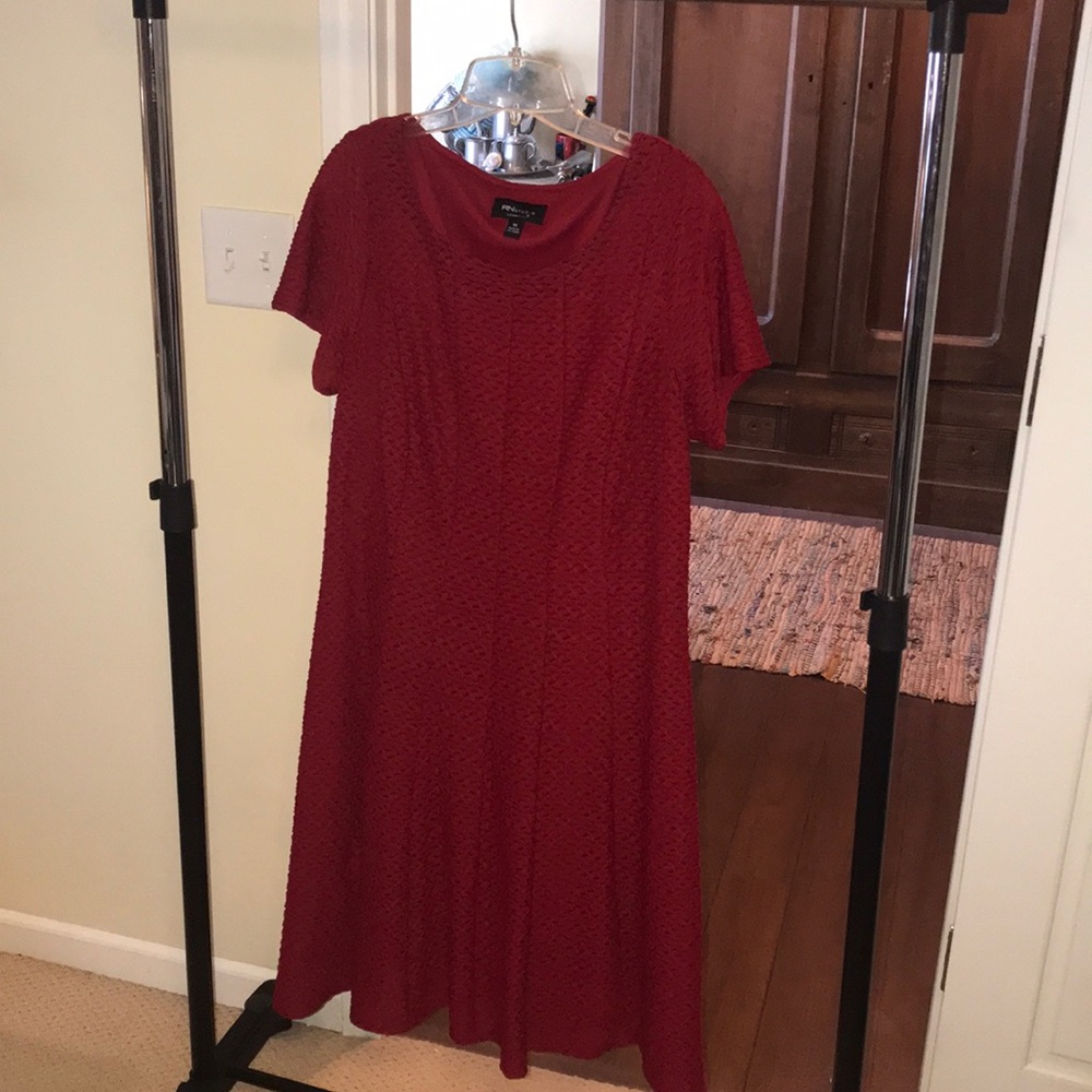 Red flare dress, with eyelets.